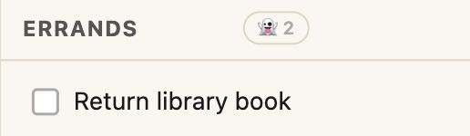 Screenshot: Errands tile header with a 👻 2 ghost pill showing two hidden dormant tasks, and one active task visible below.